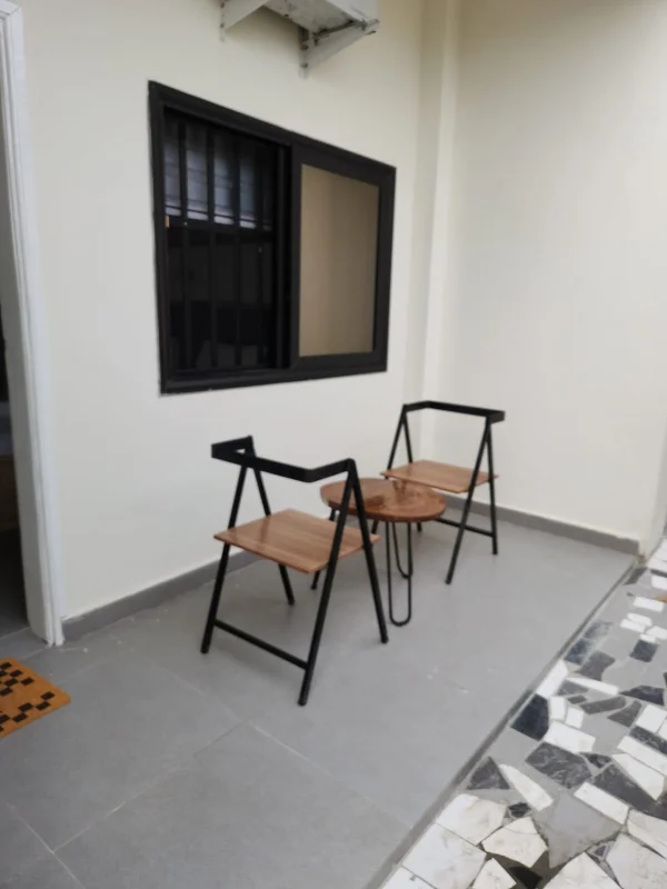 Chambre king-Size balcon — Chez Géro, Fidjrossè Cotonou